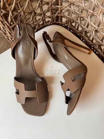 Brown leather slingback heels - size not specified, gently used