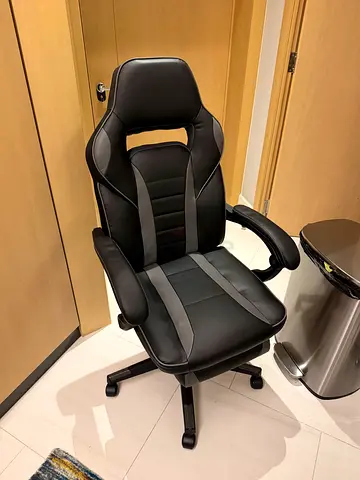 Black gaming/office chair with headrest - good condition