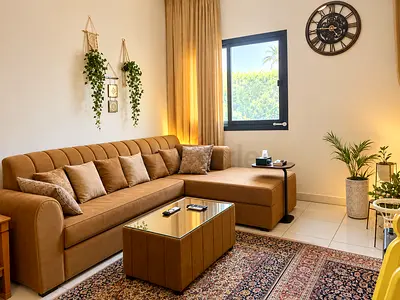 L-shaped brown leather sofa with ottoman - Brand new condition..!!