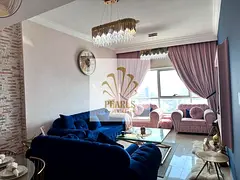 Fully furnished 2-bedroom apartment in Conqueror Tower, Ajman. 1,585 sq. ft., 2 bathrooms, parking, 