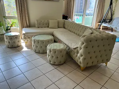 Large Beige Tufted L-Shaped Sofa with Poufs - Good Condition