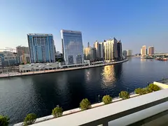 Upgraded! Fully Furnished | Canal & Burj Khalifa View | Prime Location
