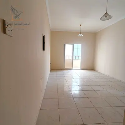 One-bedroom apartment with a living room, balcony, and central air conditioning – Khalifa Street