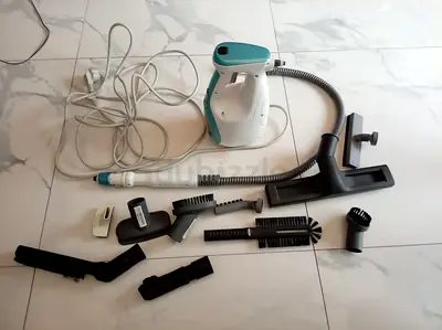 Handheld Garment Steamer with Multiple Brush Attachments - Good Condition