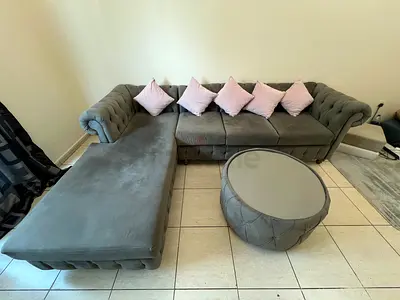 Grey Velvet L-Shaped Chesterfield Sofa with Ottoman and Cushions