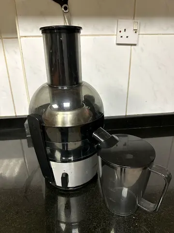 Used electric juicer / extractor with pulp jug