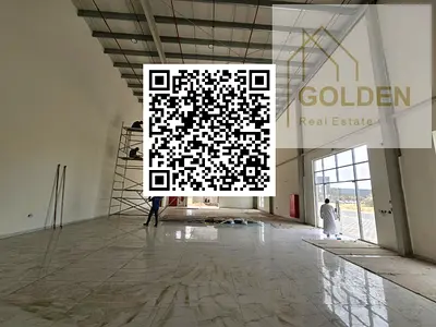 A brand-new, first-occupancy showroom featuring a modern glass façade, an 11-metre height, ceramic flooring, and an internal bathroom. The property al