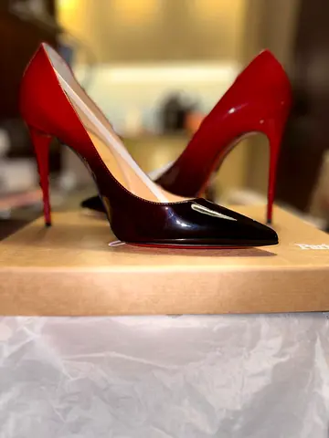 Christian Louboutin. Louboutin box. Pair of red ombré patent leather high heels, size 38.5