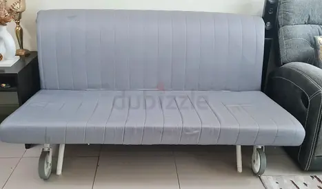 IKEA Grey Convertible Sofa Bed on Wheels - Compact 3-Seater