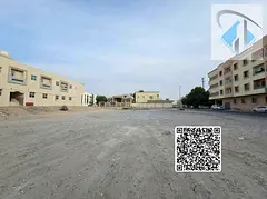 Residential-commercial land for sale in Al Muwaihat 3, Ajman.