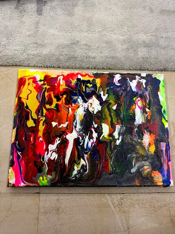 Abstract acrylic pour painting on canvas — vibrant multicolor artwork