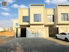 Villa for sale at an attractive price, freehold, featuring a Dubai-style design and located directly
