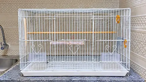 Three White one black metal bird 4 cages with removable tray - good condition