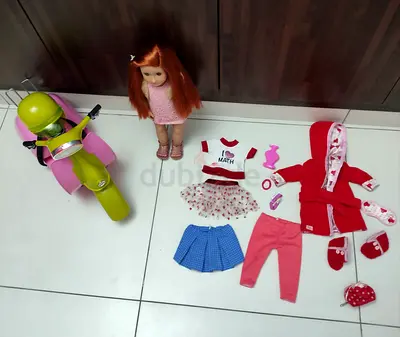Our generation doll with scooter and multiple outfits
