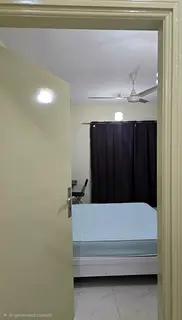 Spacious Family Room with Balcony in Al Karama (Sheikh Hamdan Colony)