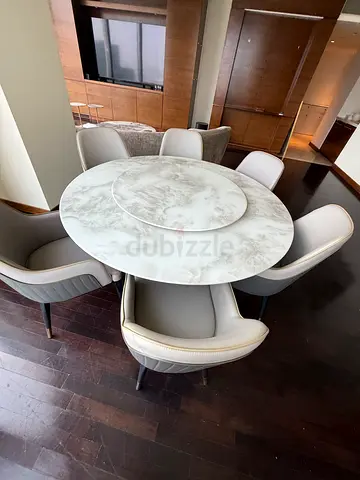 Round marble-effect dining table with 6 upholstered chairs