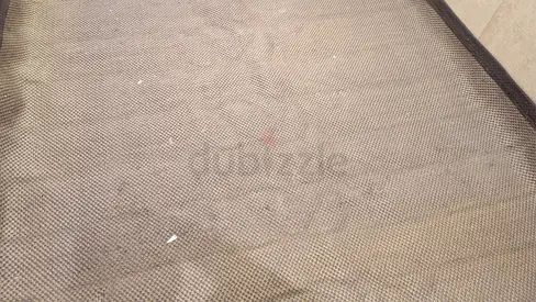 Large light grey textured area rug - used, good condition