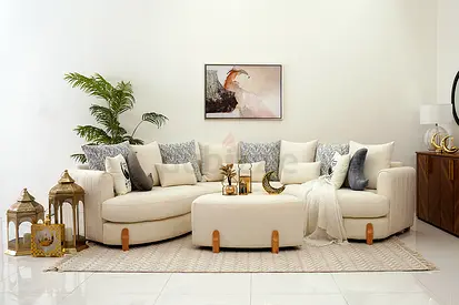 Cream curved sectional sofa with ottoman - modern 4-seater