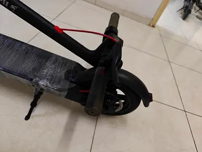 electric scooter (foldable) - good working wed charger Range 17km (sharjah near Abushagara 🚥 sign)