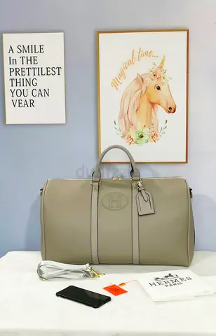 Large taupe Hermes-style travel duffel bag, - master clone
