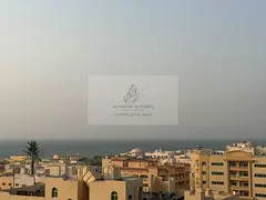 🌊 2-Bedroom Apartment with Sea View in Al Qulayaah, Sharjah –