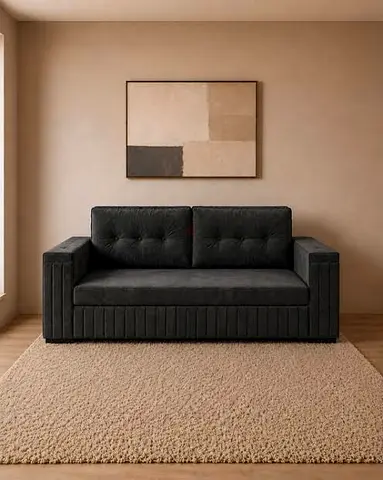 Compact two-seater black fabric sofa — good condition
