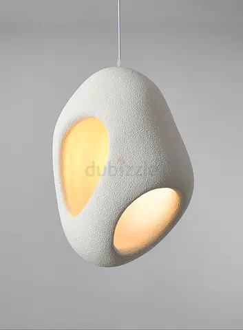 Modern textured white pendant lamp with organic shape