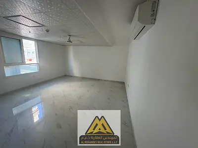 Spacious studio for annual rent in Al Mowaihat 3, Ajman. Fully separate kitchen, split AC, easy access to Sheikh Mohammed Bin Zayed Road and exits to