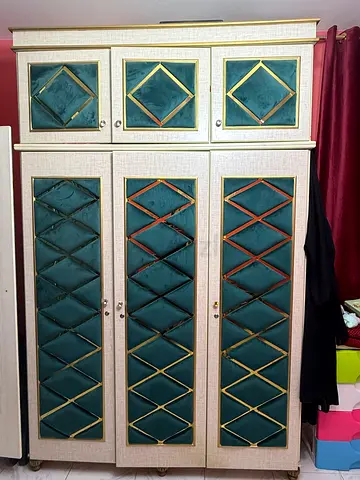 Large vintage-style wardrobe / armoire with decorative panels