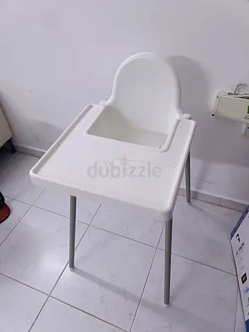 white plastic high chair  neat & clean