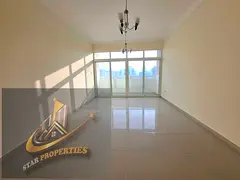 BIG OFFER // FREE COVERD PARKING// HUGE 2 BEDROOM HALL WITH BALCONY + SEPRATE HALL ONLY 42K IN 6 CHQ