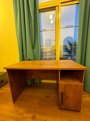 Heavy wooden study desk with small storage cabinet