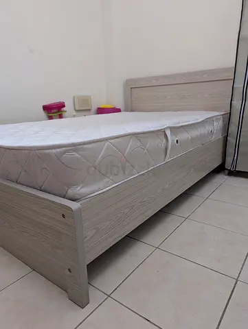 Double bed with high quality mattress in NEW condition