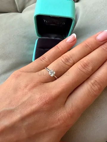 Solitaire diamond engagement ring in white gold (size visible)