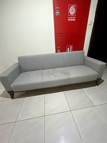 Light grey 3 seater fabric sofa in good condition