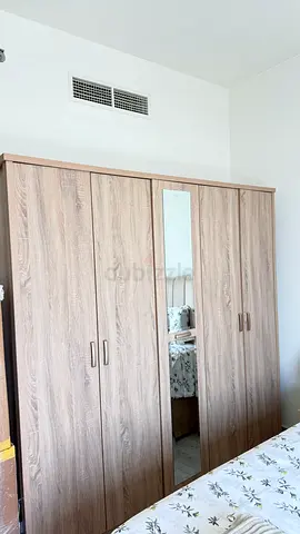 Wardrobe 5 doors and dresser with mirror and hidden shelf storage