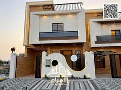 For sale in Al Hilew 2, near Azha Roundabout: A luxurious townhouse featuring a stone facade on both