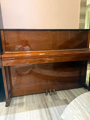Upright Acoustic Piano in Wood Finish - excellent Condition