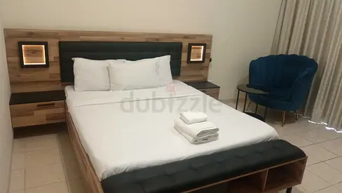 Queen bed with integrated headboard and side drawers - good condition