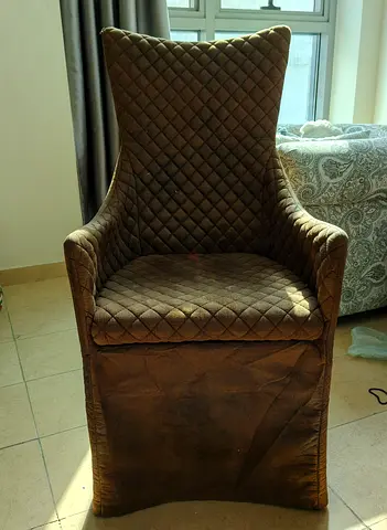 Brown quilted high-back accent chair — excellent condition