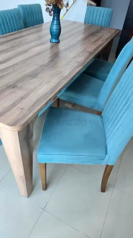 Blue upholstered dining chair in good condition