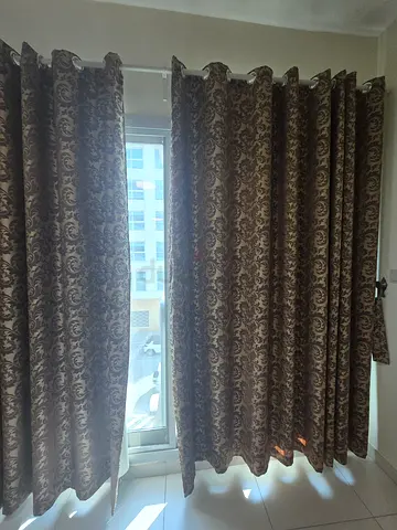 Pair of patterned fabric black out curtains - good condition