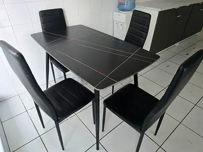Black modern dining table with 4 faux leather chairs - good condition