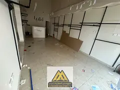 Two connected shops in Rawda 2, Sheikh Ammar Street, Ajman. 700 sq ft, AED 100K yearly.