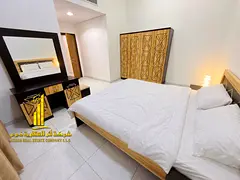 Luxury apartment (second occupancy), featuring a bedroom, a living room, and an open balcony. in Al
