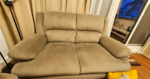 Pan Emirates Two-seater beige fabric sofai in an excellent condition