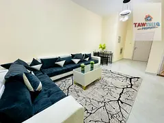 Two-bedroom apartment with a living room for monthly rent in Al Nuaimiya 2, Ajman, fully furnished w