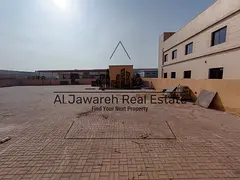A compound directly on the street with offices and restrooms in Umm Al Quwain.