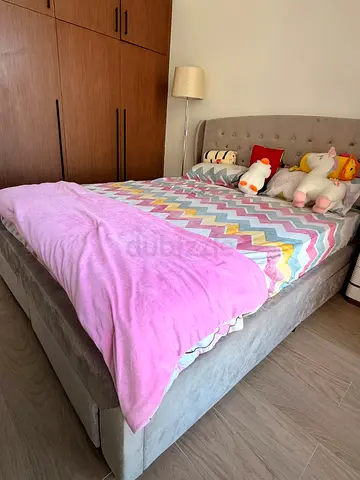 Light grey upholstered queen bed with tufted headboard and mattress - good condition (unused)