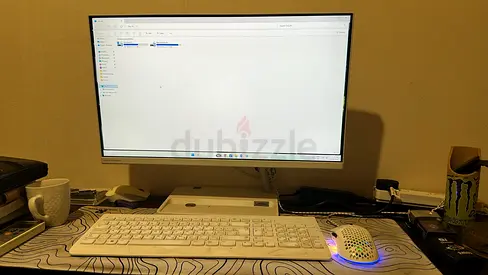 Complete desktop setup with 27-inch monitor, keyboard and mouse